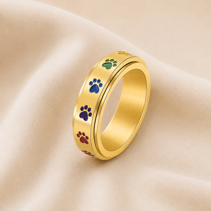 Anillo Antiestrés Giratorio – Acero Inoxidable con Huellas Arcoíris