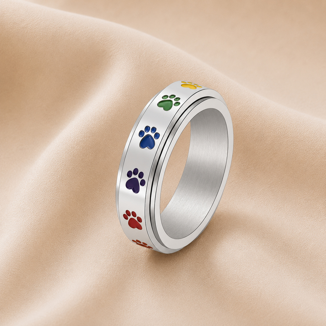 Anillo Antiestrés Giratorio – Acero Inoxidable con Huellas Arcoíris