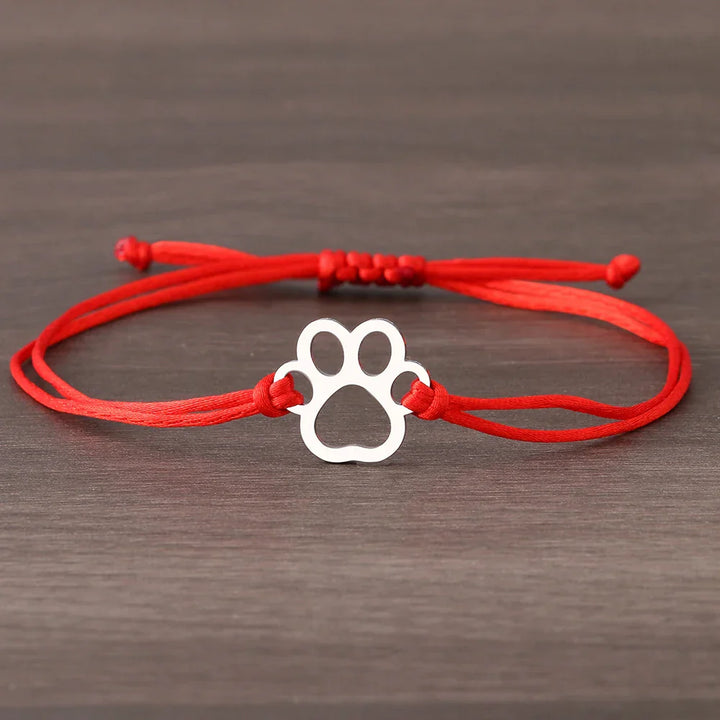 Pulsera de Cordón con Huella de Patas – Diseño Ajustable en Negro y Rojo