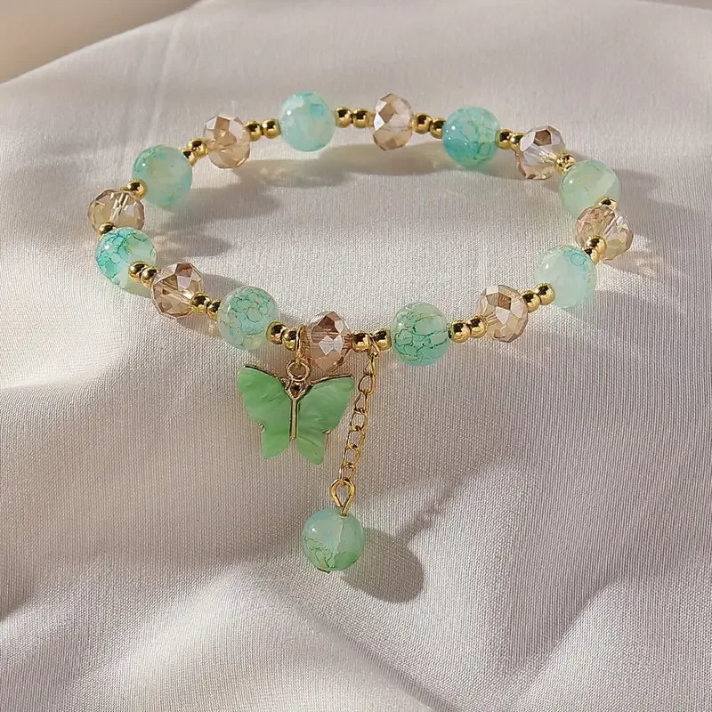 Hermosa Pulsera de Cuentas Elásticas con Mariposa