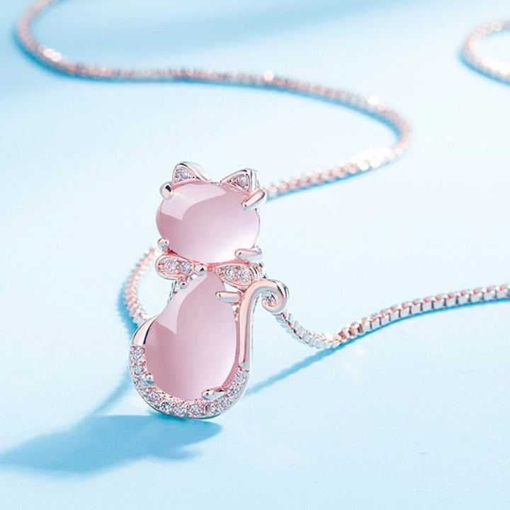 Collar de gato encantador con piedra rosa y zirconia