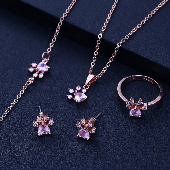 Conjunto de Joyería de Huella en Oro Rosa – 4 Piezas con Corazón de Zirconia (Anillo, Collar, Pendientes, Pulsera)